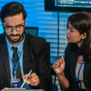 Cybersecurity Experts going over a Cybersecurity Due Diligence M&A Checklist