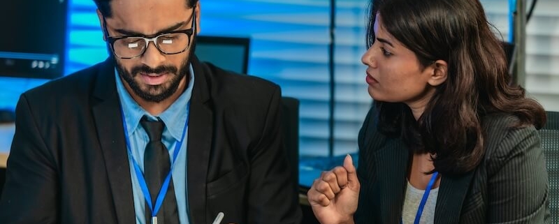 Cybersecurity Experts going over a Cybersecurity Due Diligence M&A Checklist